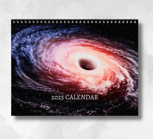 2025 Space Calendar featuring a cover image of a black hole in space, showing a swirling yellowish, pink swirl into the black hole.